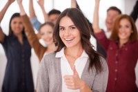 Diverse group of business people cheering