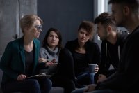 Female counselor leading a support group