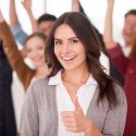 Diverse group of business people cheering