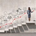 Woman on staircase leading up to success