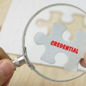 Puzzle piece with the word "credential" on it