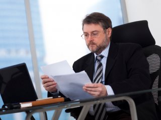 Man at desk with computer